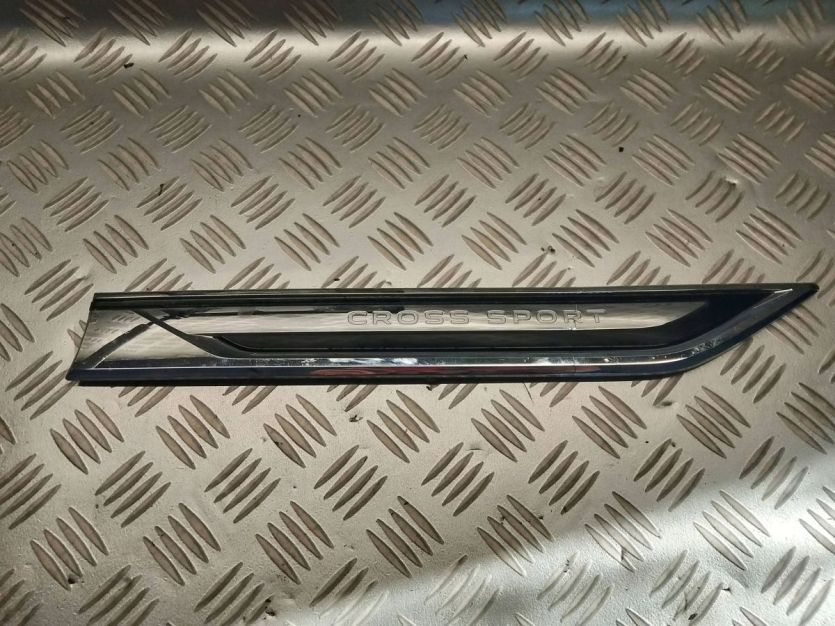 VW ATLAS CROSS 2021 EMBLEMAT ZNACZEK DRZWI LEWY PRZÓD 3CM853689A