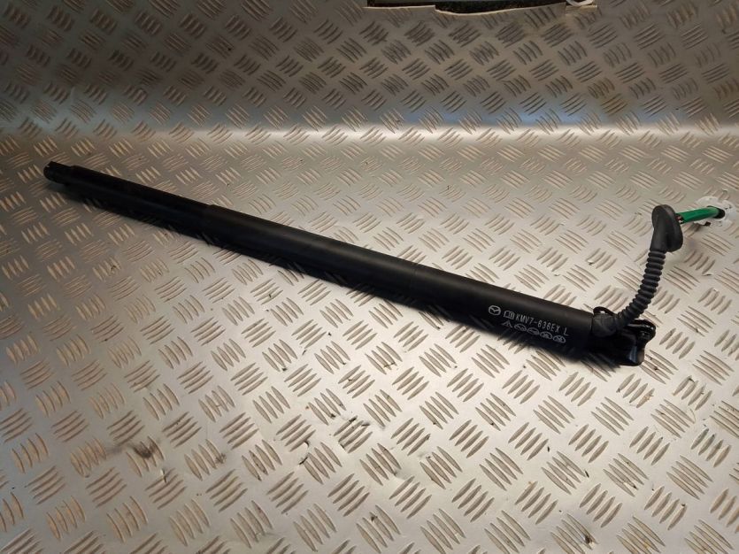 MAZDA CX90 CX-90 2024 SIŁOWNIK KLAPY LEWY KMV7636EX