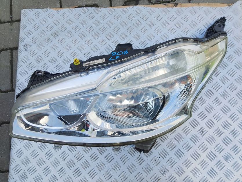 PEUGEO 208 I LAMPA LEWY PRZÓD LEWA PRZEDNIA 9802221880