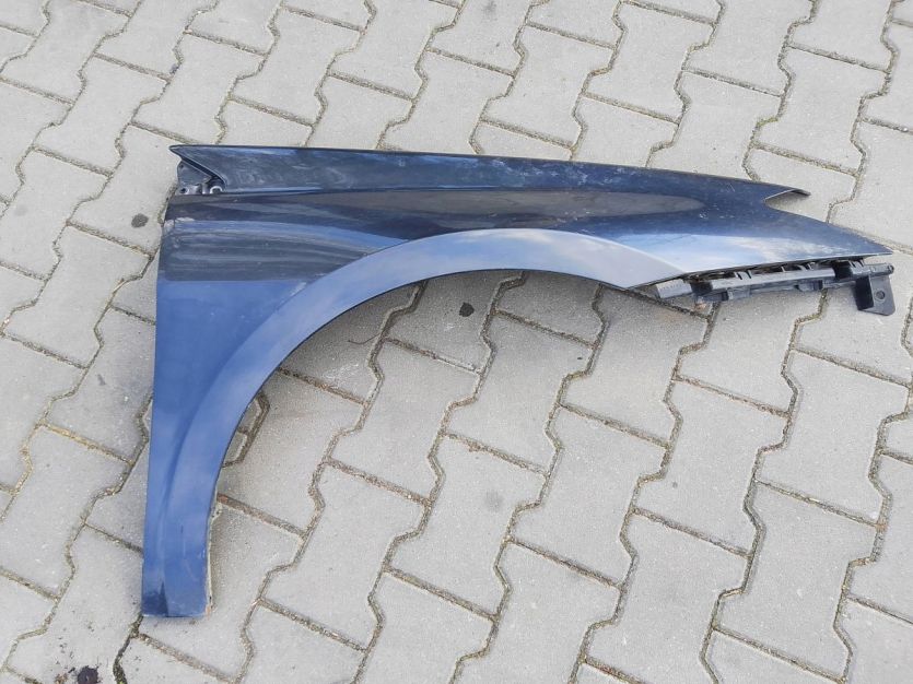RENAULT LAGUNA III 3 BŁOTNIK PRAWY PRZÓD PRZEDNI 622200006R