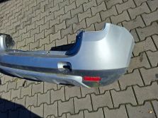 DACIA DUSTER I 2011 zderzak tyl tylny tylni srerbrny TED69