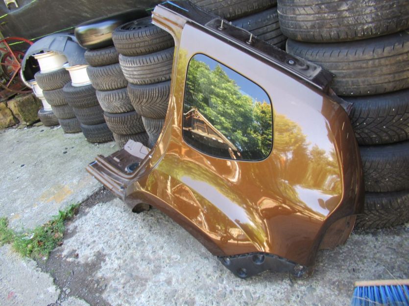 DACIA DUSTER I LIFT BŁOTNIK LEWY TYŁ TECNA WYSYŁK A