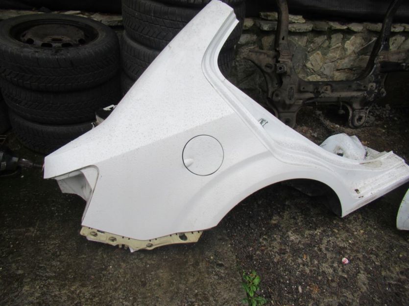 CHEVROLET AVEO T300 SEDAN BŁOTNIK PRAWY TYŁ WYSYŁKA