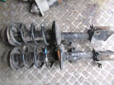 DACIA DUSTER I 2011 R. 1.6 16V AMORTYZATOR LEWY PRZÓD