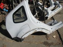 DACIA DUSTER I BŁOTNIK PRAWY TYŁ WYSYŁKA