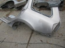 LOGAN II kombi MCV 2016 R. BŁOTNIK LEWY TYŁ