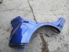 NISSAN JUKE I LIFT 2015 R. BŁOTNIK PRAWY TYŁ