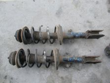 DACIA DUSTER I LIFT 1.6 SCE 4X4 AMORTYZATOR LEWY PRZÓD