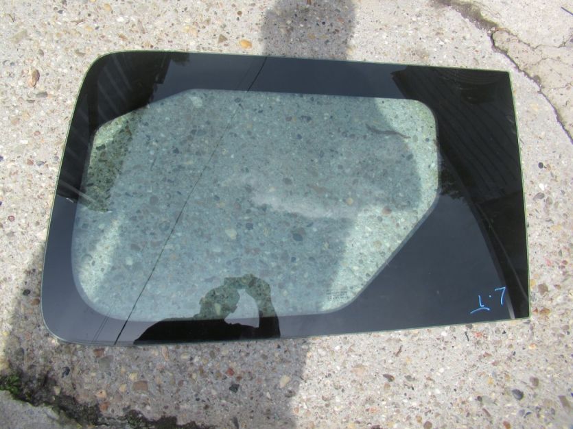 DACIA DOKKER SZYBA LEWY TYŁ