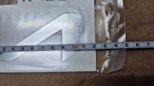 Emblemat Napis Znaczek TYŁ KIA OE 86300-R2200 21 cm ORYGINAŁ NOWY ASO !!!
