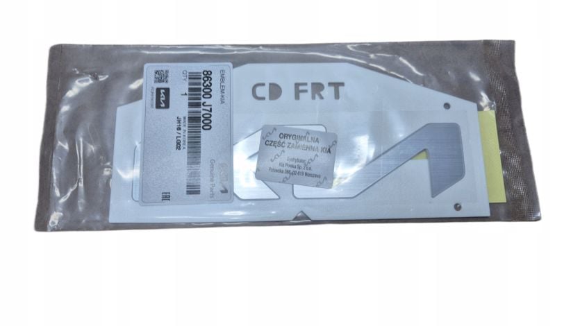 Emblemat Napis Znaczek PRZÓD KIA OE 86300-J7000 ORYGINAŁ NOWY ASO !!!