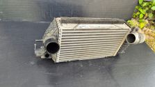 Intercooler Chłodnica powietrza Kia Sportage V NQ5 Tucson IV OE 28270-2M800